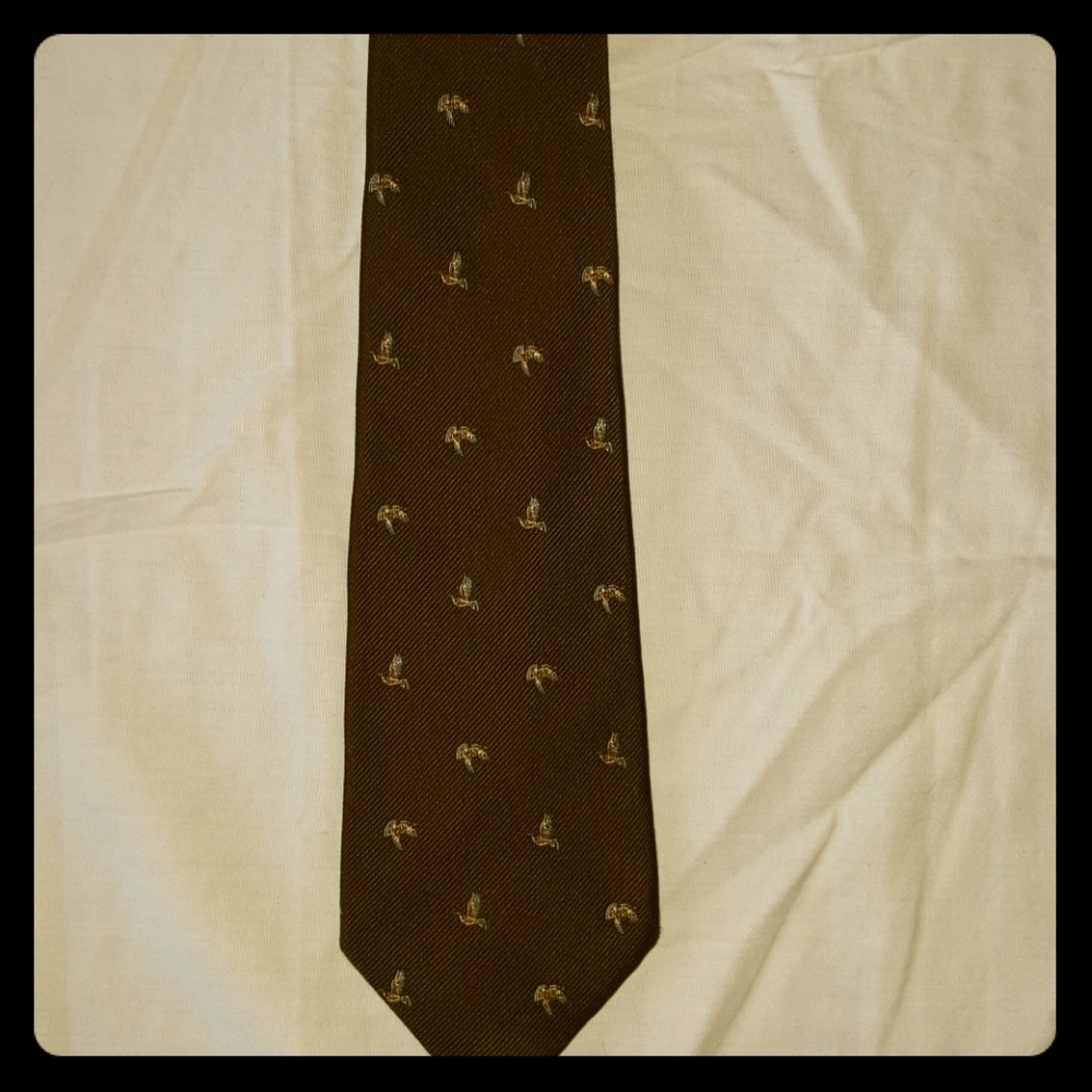 Vintage resilio tie with flying bird pattern